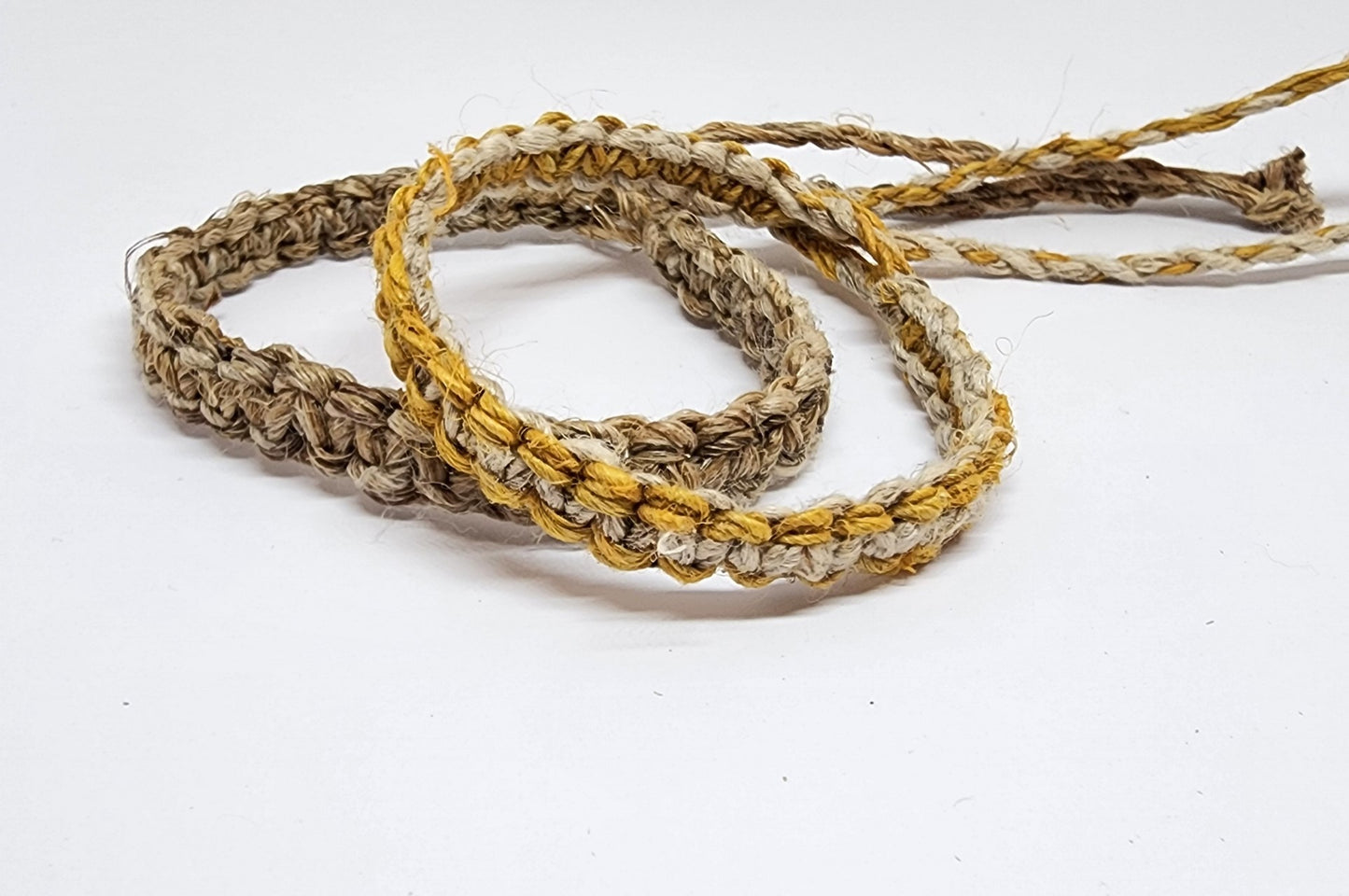 Handmade Braided Hemp Bracelet; Pack of Two, Natural and Yellow.
