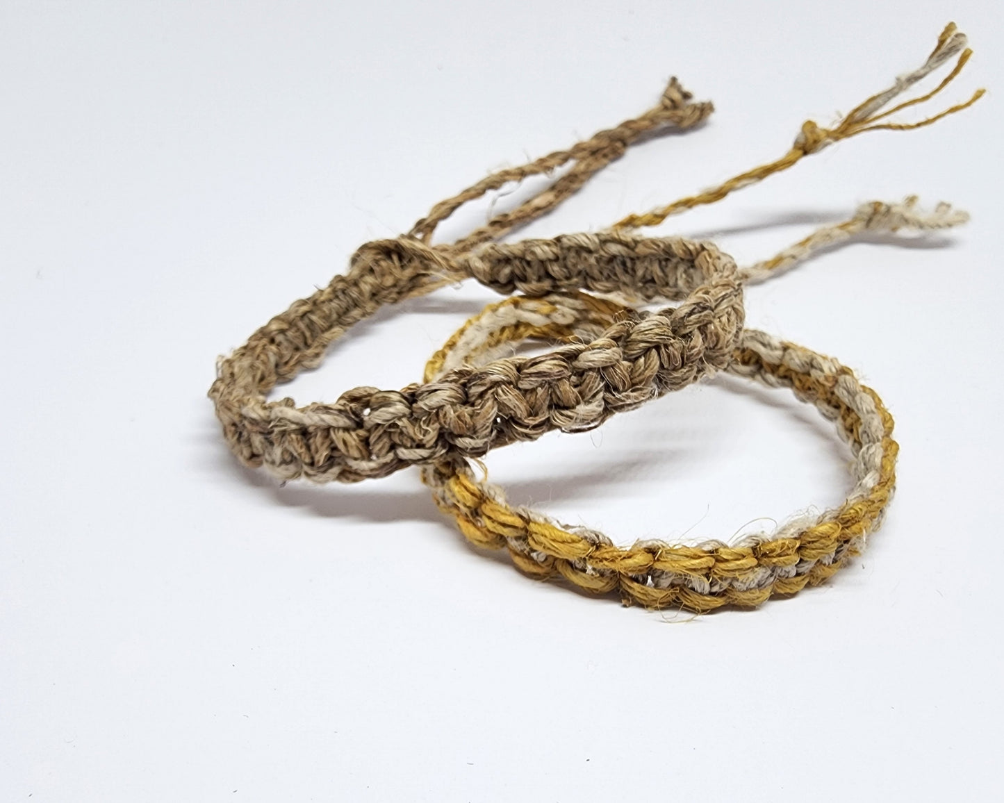 Handmade Braided Hemp Bracelet; Pack of Two, Natural and Yellow.