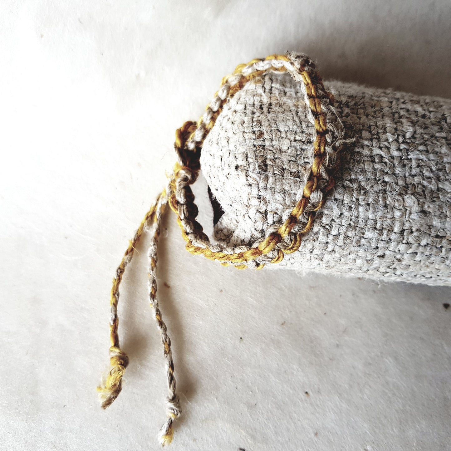 Handmade Braided Hemp Bracelet; Pack of Two, Natural and Yellow.