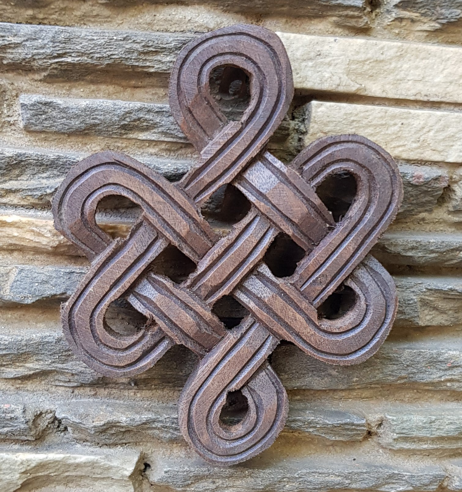 Infinity Knot Wood Carving, rounded - hand carved in Nepal (Small)