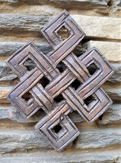Infinity Knot Wood Carving - hand carved in nepal (medium)