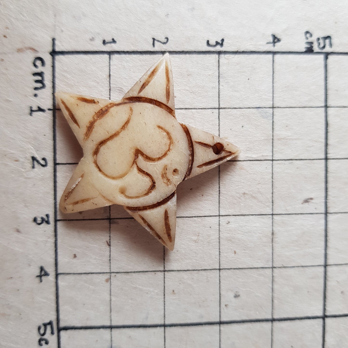Om and Star shaped Bone Pendant