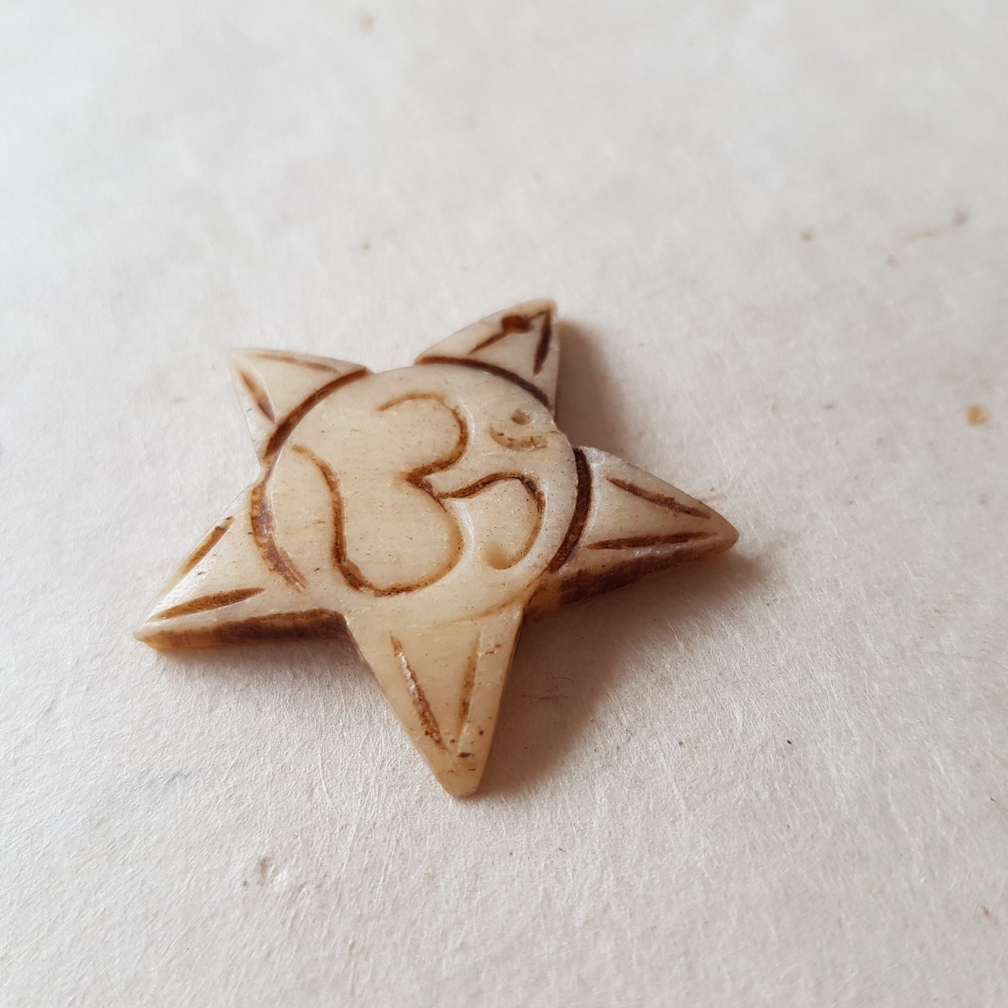 Om and Star shaped Bone Pendant